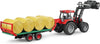 BRUDER BALE TRAILER WITH 8 ROUND BALES