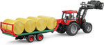 BRUDER BALE TRAILER WITH 8 ROUND BALES