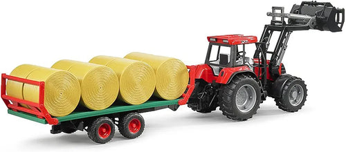 BRUDER BALE TRAILER WITH 8 ROUND BALES
