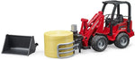 BRUDER SCHAFFER COMPACT LOADER 2630 W/BALE GRIPPER & 1 ROUND BALE
