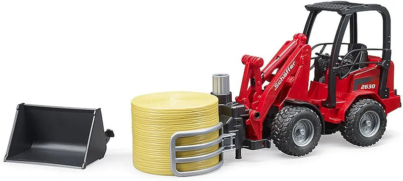 BRUDER SCHAFFER COMPACT LOADER 2630 W/BALE GRIPPER & 1 ROUND BALE