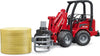 BRUDER SCHAFFER COMPACT LOADER 2630 W/BALE GRIPPER & 1 ROUND BALE