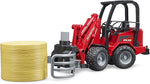 BRUDER SCHAFFER COMPACT LOADER 2630 W/BALE GRIPPER & 1 ROUND BALE
