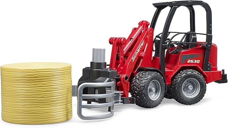 BRUDER SCHAFFER COMPACT LOADER 2630 W/BALE GRIPPER & 1 ROUND BALE