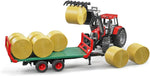 BRUDER BALE TRAILER WITH 8 ROUND BALES