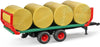 BRUDER BALE TRAILER WITH 8 ROUND BALES