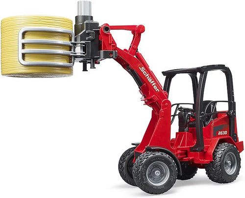 BRUDER SCHAFFER COMPACT LOADER 2630 W/BALE GRIPPER & 1 ROUND BALE