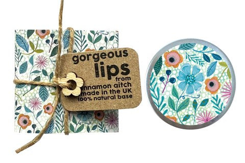 Cinnamon Aitch Lip balm AG Blue ditsy pattern orange and mandarin